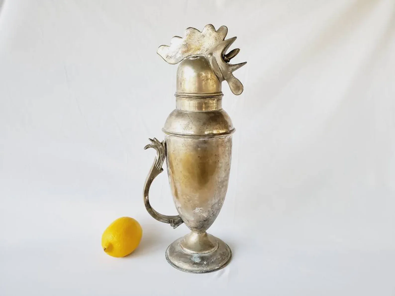 https://mixologists.co/content/images/2022/04/rooster-cocktail-shaker.webp